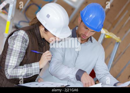 construction site team having discussion of plan Stock Photo