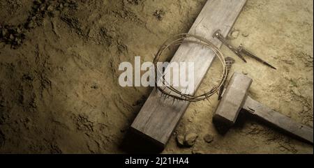 Crucifixion of Jesus Christ. Cross With three Nails And Crown Of Thorns on ground Christianity Concept Background Stock Photo