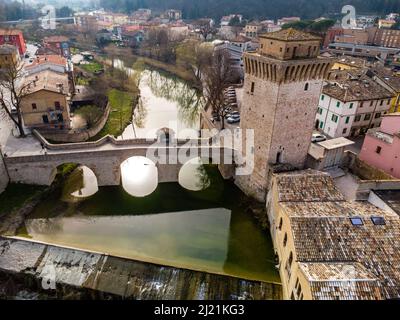 Fermignano tower and waterfall in Italy Stock Photo