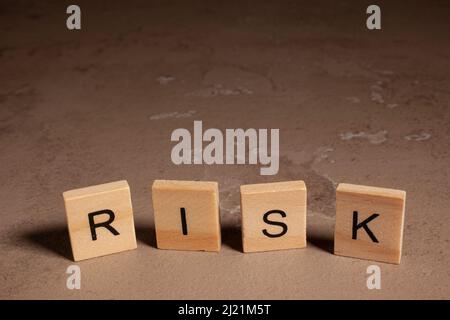 Risk Word on Wooden Tile Block Stock Photo