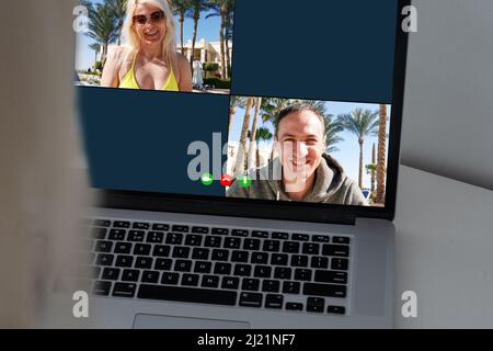 Zoom conference. Business partners communicate via video using laptop. The guy talks with his business partners appearance about plans and strategy Stock Photo