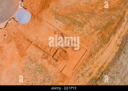 Aerial top view of laying pipes for underground sewage water system for new home Stock Photo