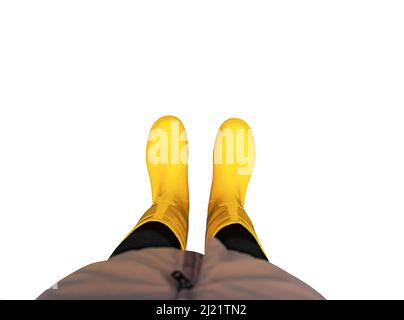 Legs in rubber boots on a white background. Stock Photo