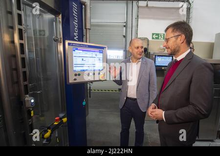 Ceske Budejovice, Czech Republic. 29th Mar, 2022. State-run brewery Budejovicky Budvar has put into operation a new line for canning beer with an hourly capacity of 40,000 cans, investing around Kc300m in the line, the brewery's representatives told journalists in Ceske Budejovice, Czech Republic, March 29, 2022. From left Adam Broz, Production Manager of Budvar and Zdenek Nekula, Agriculture Minister, Credit: Vaclav Pancer/CTK Photo/Alamy Live News Stock Photo