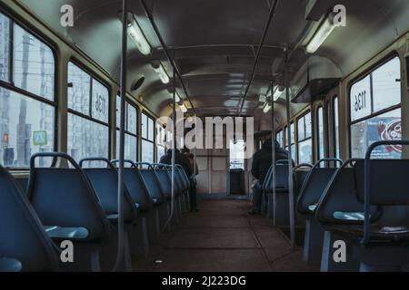 Ulyanovsk, Russia. 2022, 05 March. Inside the old Tatra tram. The melancholy mood of the ride. A sad post-Soviet space Stock Photo