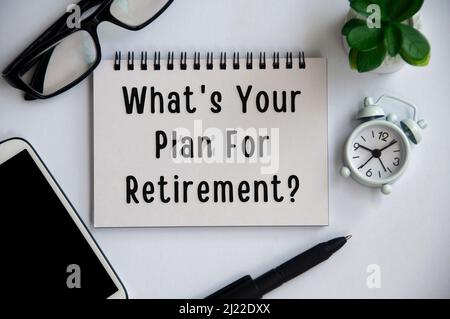 What is you plan for retirement text on notepad with office background concept. Retirement planning concept Stock Photo