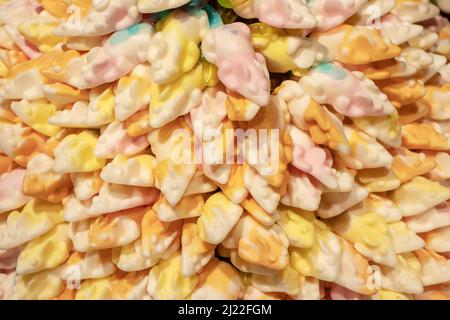 Multicolored jelly stick candies textured background. Stock Photo