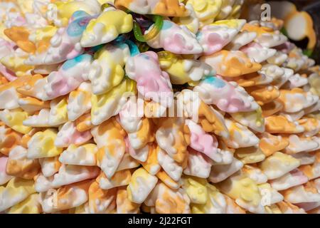 Multicolored jelly stick candies textured background. Stock Photo
