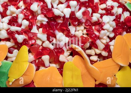 Multicolored jelly stick candies textured background. Stock Photo