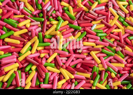Multicolored jelly stick candies textured background. Stock Photo