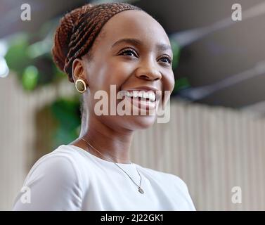 Golden gates were talking over. Shot of a beautiful young woman talking to her colleagues outside. Stock Photo