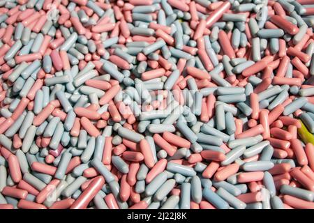Multicolored jelly stick candies textured background. Stock Photo