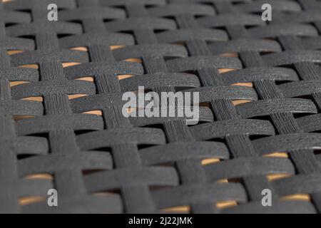 Mesh from plastic rattan garden furniture Stock Photo