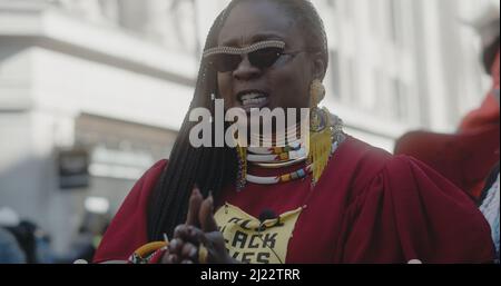 London, UK - 03 19 2022:  A black woman being interviewed and speaking passionately, in support for ‘Child Q’, at the yearly ‘March Against Racism’. Stock Photo