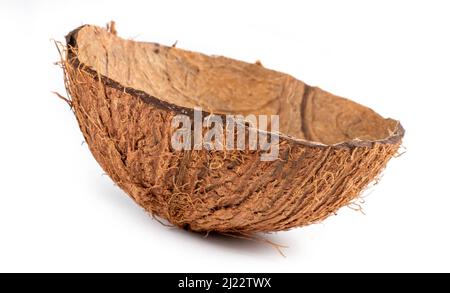 Coconut fruit shell cut in half isolated on white background. Stock Photo
