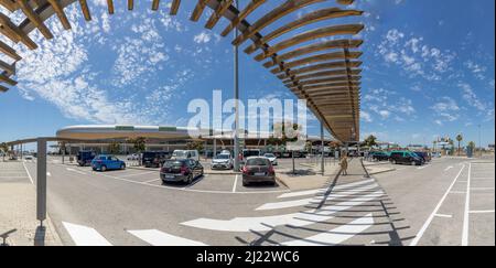 Faro, Portugal -July 11, 2020: Exterior view of Faro International Airport with just a few cars parking due to Corona shutdown in Portugal. Stock Photo