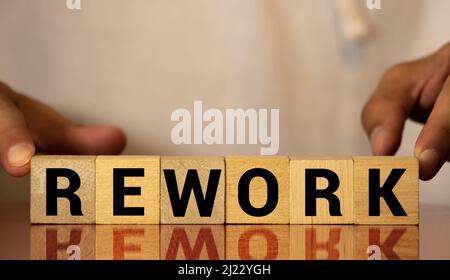 Alphabet letter with word rework in black line hand drawing as bubble ...