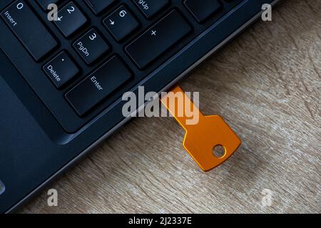 Close-up of a flash drive connected on a laptop Stock Photo