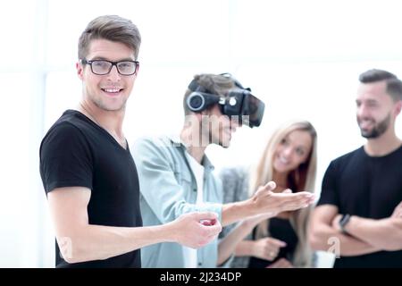 Young hipsters are working on a new start up project in a modern coworking space. Stock Photo