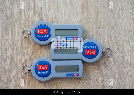 Timisoara, Romania - June 20, 2021: Close-up on a RSA SecurID token on a wooden table, SID700 Stock Photo