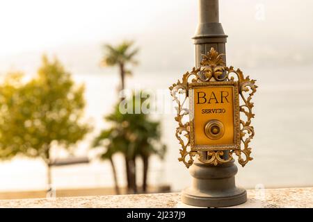 Italy, Lake Como, Bellagio, bar service button Stock Photo