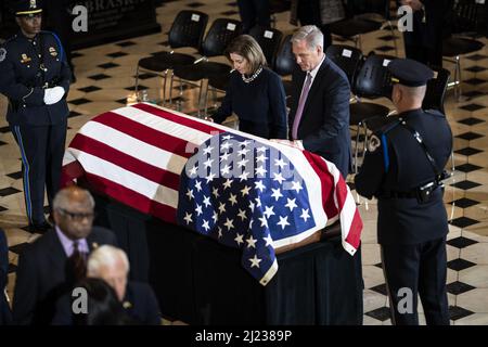 Washington, United States. 29th Mar, 2022. Speaker of the House Nancy Pelosi and House Minority Leader Kevin McCarthy pause at the casket of Republican Representative from Alaska Don Young as he lies in state in Statuary Hall at the U.S. Capitol in Washington DC, on Tuesday, March 29, 2022. Young, who died March 18, 2022, was the longest-serving Republican in Congress and had represented Alaska since 1973. Pool photo by Jabin Botsford/UPI Credit: UPI/Alamy Live News Stock Photo