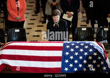 Washington, USA. 29th Mar, 2022. UNITED STATES - MARCH 29: House chaplain Margaret Grun Kibben pays her respects to Rep. Don Young, R-Alaska, at the casket as he lies in state in National Statuary Hall in the U.S. Capitol on Tuesday, March 29, 2022. (Photo by Bill Clark/Pool/Sipa USA) Credit: Sipa USA/Alamy Live News Stock Photo