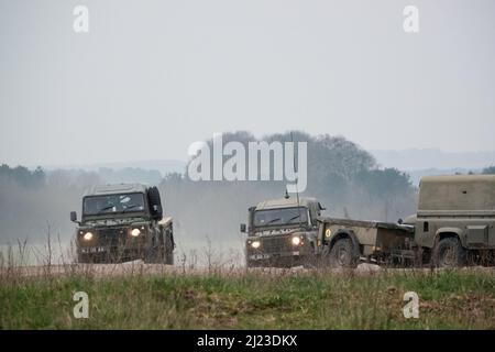 Land Rover Convoy a small convoy British Army Land Rover Defender Wolf medium utility ...