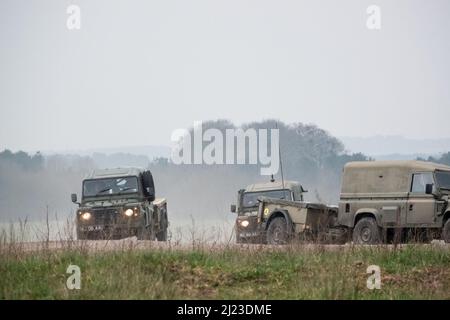 Land Rover Convoy a small convoy British Army Land Rover Defender Wolf medium utility ...