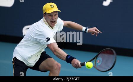 Miami Gardens, United States. 29th Mar, 2022. Jenson Brooksby from the USA returns a backhand to Danil Medvedev from Russia at the Miami Open tennis tournament in the Hard Rock Stadium in Miami Gardens, Florida, on Tuesday, March 29, 2022. Medvedev defeated Brooksby 7-5, 6-1. Photo by Gary I Rothstein/UPI Credit: UPI/Alamy Live News Stock Photo