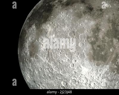 Close up super moon Against a Black Outer Space Background Stock Photo