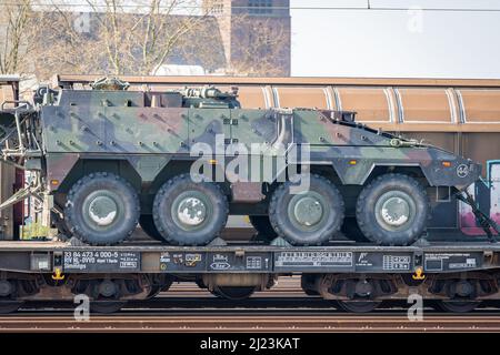 Venlo, Province Limburg, The Netherlands, 26.03.2022, Close up of military vehicle being transported by the rail freight transport Stock Photo