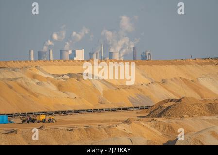 Edge of the Garzweiler surface mine in Germany with a view on the nearby power plant Stock Photo