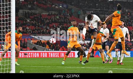 London, UK. 29th Mar, 2022. Tyrone Mings (England) heads to score the 3rd England goal during the International Friendly match between England and Ivory Coast at Wembley Stadium on March 29th 2022 in London, England. (Photo by Garry Bowden/phcimages.com) Credit: PHC Images/Alamy Live News