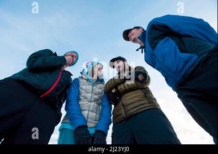 A group of friends having fun in the winter Stock Photo