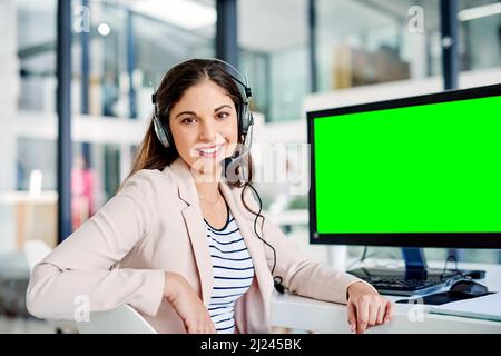 Resolving issues as soon as they arise. Cropped portrait of an attractive young female customer care agent at work in her office. Stock Photo