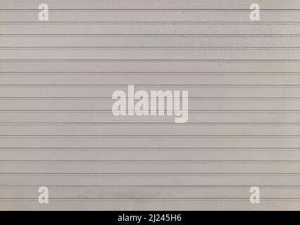 Background of gray and white color painted horizontal metal window roller shutter blinds, wood textured Stock Photo
