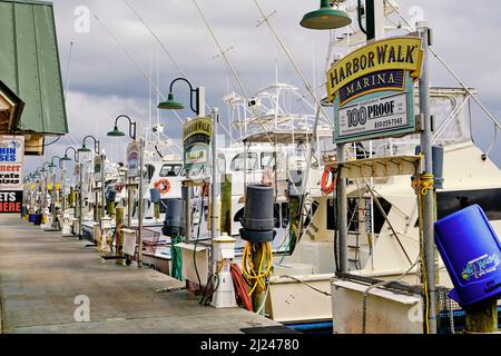 Destin sport and commercial fishing boats moored at the Harborwalk Marina in Destin, Florida USA. Stock Photo