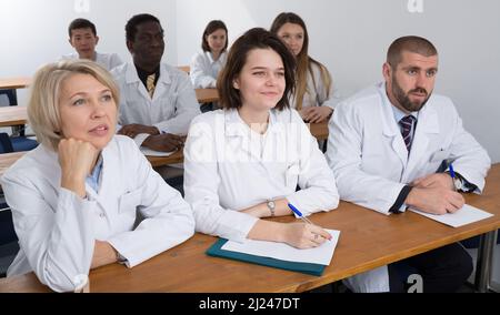 Group of physicians during seminar Stock Photo