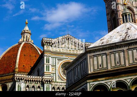 The Duomo and Campanile (back) and Baptistry (right) are three of the iconic Renaissance buildings in the centre of Florence Italy Stock Photo