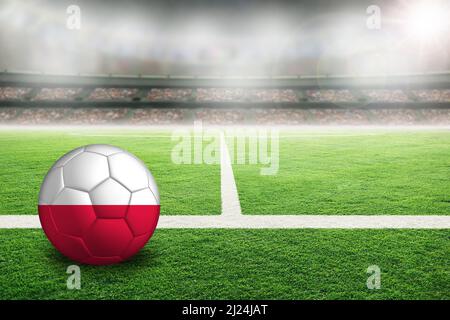 Football in brightly lit outdoor stadium with painted flag of Poland. Focus on foreground and soccer ball with shallow depth of field on background an Stock Photo