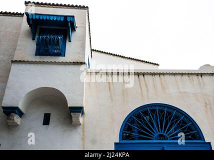 View of a typical window and balcony in the Mediterranean city of Sidi Bou Said, a town in northern Tunisia located about 20 km from the capital Tunis Stock Photo