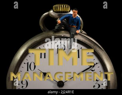 Old employee in time management concept Stock Photo - Alamy