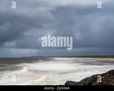 Stormy weather, big grey storm cell, ominous low clouds over Pacific Ocean, NSW, Australia Stock Photo