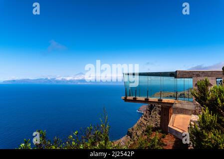 Agulo, Spain - August 9, 2021: Abrante Viewpoint. It has a famous walkway with a glass floor facing Teide Volcano Stock Photo