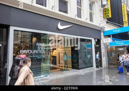 Nike store in street,Sydney city centre,NSW,Australia a wet May Day in 2022,Australia Stock Photo -