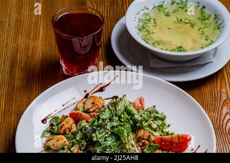 Breakfast including compote, salad, soup Stock Photo