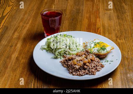 Breakfast including compote, salad, soup Stock Photo