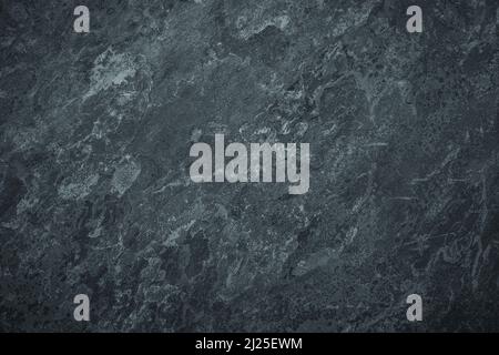 Worn granite stone background with scratched stained texture Stock Photo