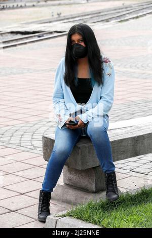 Young woman wearing a face mask in Riobamba, Ecuador Stock Photo